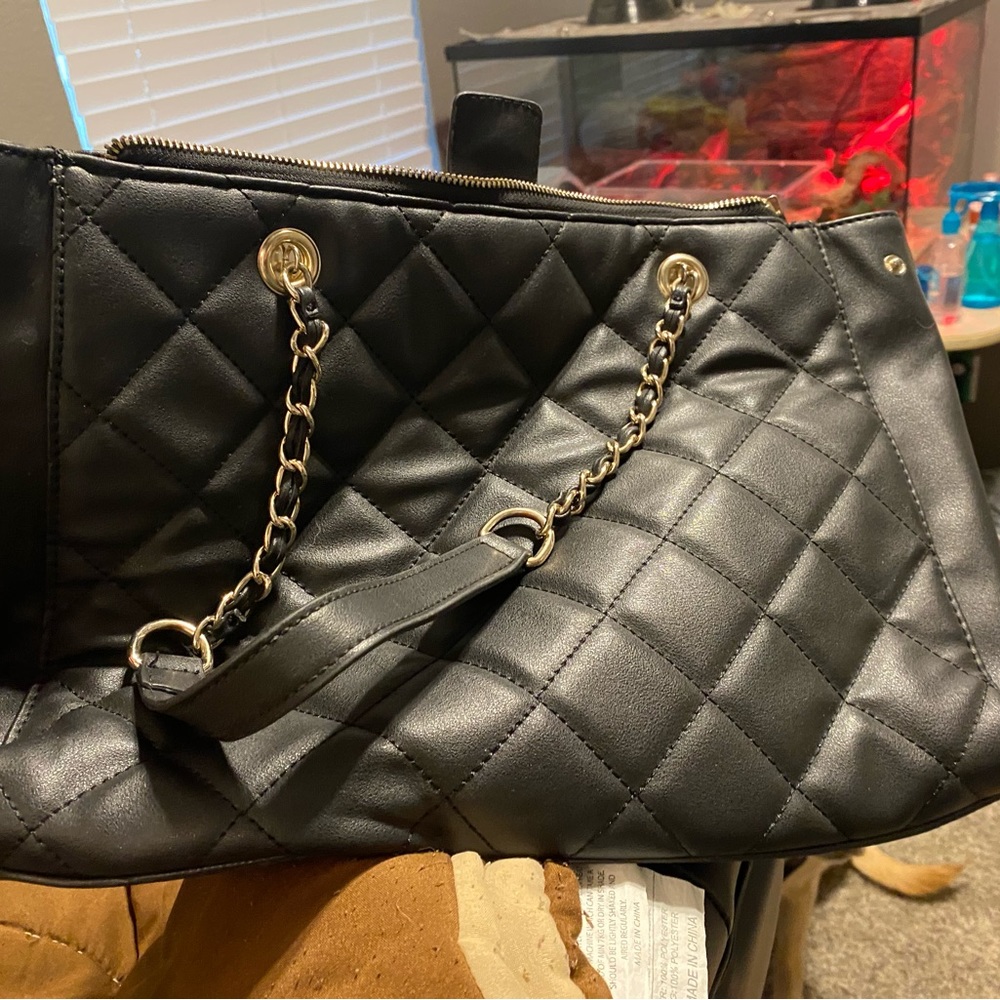 Black quilted handbag